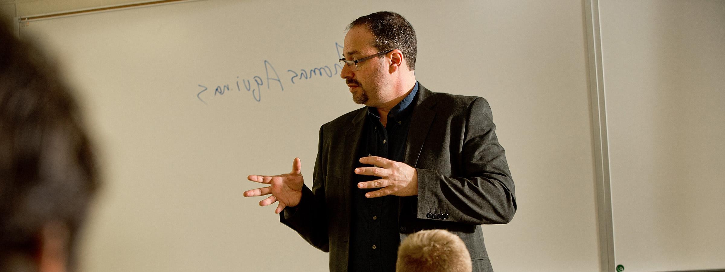 Dr. grossman speaking to a class